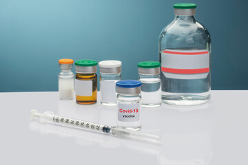 covid-19, coronavirus vaccine ampoule, bottle for injection.