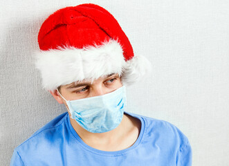 Sad Young Man in Flu Mask
