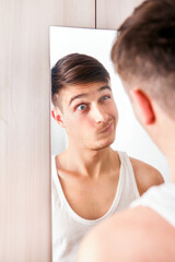 Young Man near the Mirror