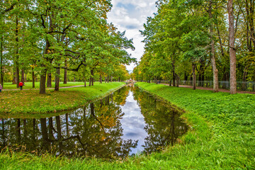 Triple alley in autumn. Bypass channel and small Chinese bridges. Alexander Park. Pushkin. St....