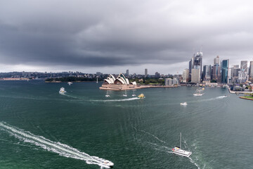Naklejka premium Sydney harbour during a thunderstorm and dark moody sky