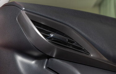 Obraz na płótnie Canvas Modern Car Air Vent in Car Interior in Low Angle View
