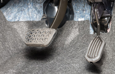 Brake Pedal and Accelerator Pedal of Car in Zoom View
