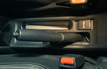 Fototapeta premium Gray Hand Brake and Seatbelt Lock Inside Car in Vintage Tone