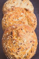 Fresh baked crunchy rolls or bread for breakfast. Vintage photo