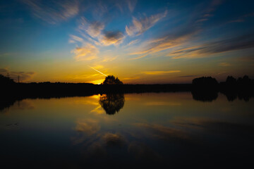 Fototapeta premium sunset over the lake