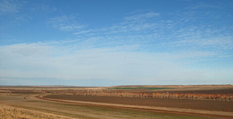 View of the steppe expanses on an autumn Sunny day. Orenburg region. Russia.