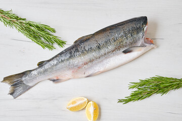 Fresh frozen loach on black background