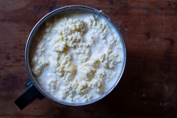Fresh butter in a jar with butter milk