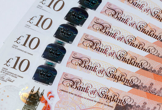 British Currency - ten pound banknotes in a spreading fan format.