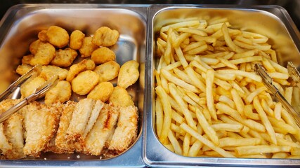 French fries and nuggets, Foods placed in the tray.
