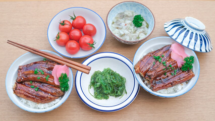 Grilled unagi set meal eat with Tako Wasabi,Seaweedd salad and Fresh Tomato.