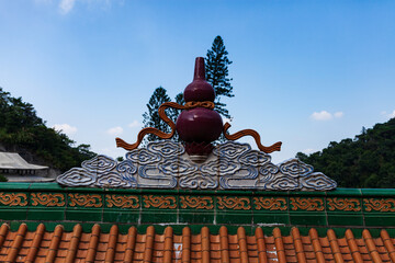 Roof of ancient Chinese Architecture, Old building under blue sky.