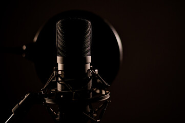 Professional microphone on a dark background