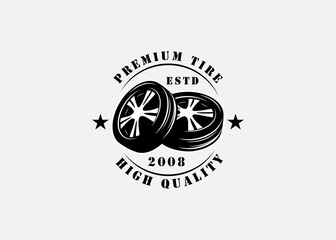 Fototapeta premium Car Wheel Logo Design Inspiration. Pile of Car Wheels Vector Template. Illustration of a Auto Wheel Repair Logo Shop.