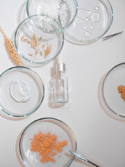 Serum for skin care, eco-friendly cosmetics. Bottles and ingredients