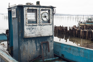 Fototapeta na wymiar An abandoned fishing boat at a small village in Japan