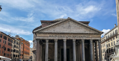 Fototapeta na wymiar Pictures from Rome Italy in Europe. Front view of the Pantheon with blue sky backdrop 