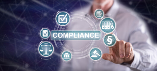 Man touching a compliance concept
