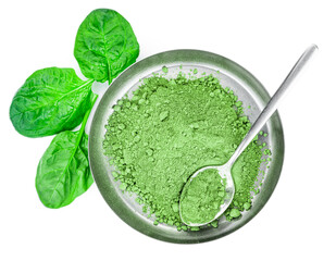 Spinach powder isolated on white (close up; selective focus)