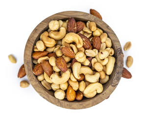 Roasted nuts isolated on white (close up; selective focus)