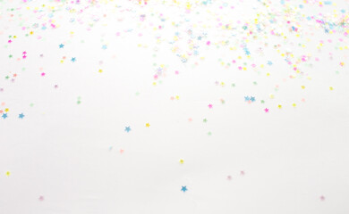 multicolored confetti on a light background view of superoo