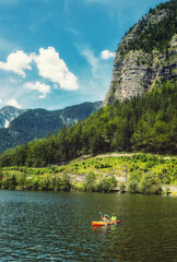 Canoes on lake Hallstatt, Hallstatt, Salzkammergut, Upper Austria, Austria