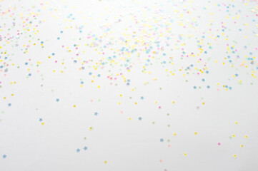 multicolored confetti on a light background view of superoo