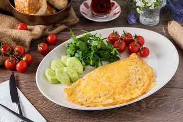 Healthy breakfast food, Stuffed egg omelette with vegetable - obrazy, fototapety, plakaty
