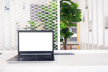 Front view white office desk table with the office equipments, computer
keyboard and other office supplies on the modern space, flat lay.