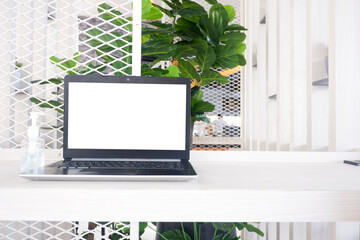 Front view white office desk table with the office equipments, computer
keyboard and other office supplies on the modern space, flat lay.