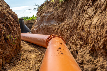 building a rainwater drainage to the collection container with the help of a plastic pipe