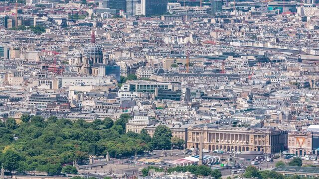 Top view of Paris skyline from above timelapse. Main landmarks of european megapolis with Place de la Concorde. Bird-eye view from observation deck of Montparnasse tower. Paris, France