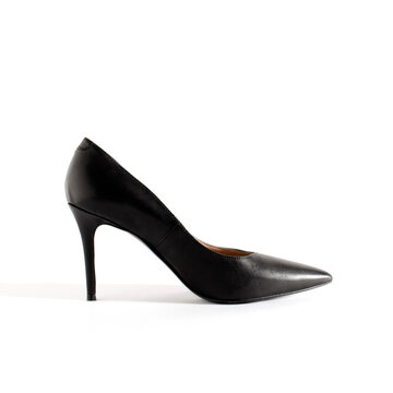 Classical black shoes. High heel shoes on white background. Side view picture. Space for text. Element for design.