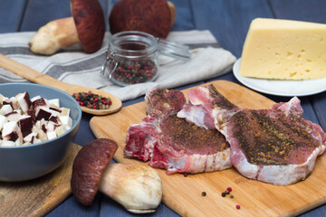 pork entrecote with mushrooms, tomatoes and cheese. intercote cooking