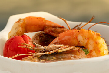 jumbo shrimp standing on white table.