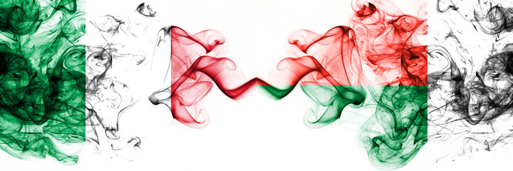 Italy vs Madagascar, Madagascan smoky mystic flags placed side by side. Thick colored silky abstract smoke flags