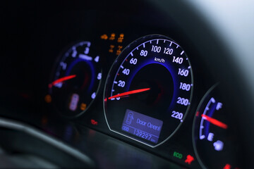 the car dashboard lights up with signal lights