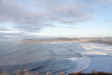 View of Salinas town and beach in Asturias, in northern Spain. Cantabric sea