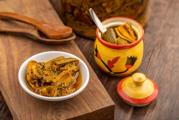 Homemade raw mango pickle, mango pickle is a traditional Indian condiment made with raw mangoes, spices and oil.