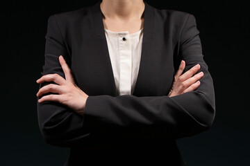 woman folds her arms over her chest