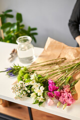 Fototapeta na wymiar Bouquet 007, step by step installation of flowers in a vase. Flowers bunch, set for home. Fresh cut flowers for decoration home. European floral shop. Delivery fresh cut flower.
