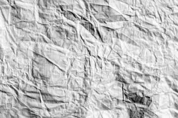 Crumpled white paper as an abstract background.