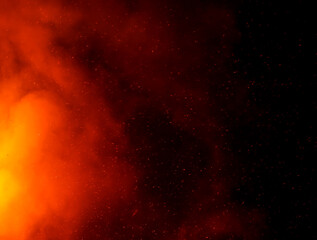 Red sparks of fire on a black background.