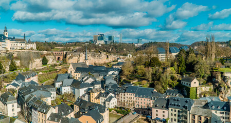 Obraz premium Amazing horizontal aerial panoramic view of Luxembourg-City, Luxembourg with Grund, old town, and Kirchberg business district