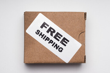 Cardboard box with the inscription free shipping, top view