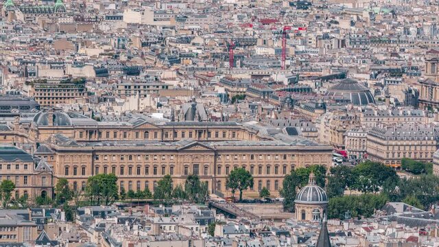 Top view of Paris skyline from above timelapse. Main landmarks of european megapolis with Bridge of Arts. Bird-eye view from observation deck of Montparnasse tower. Paris, France