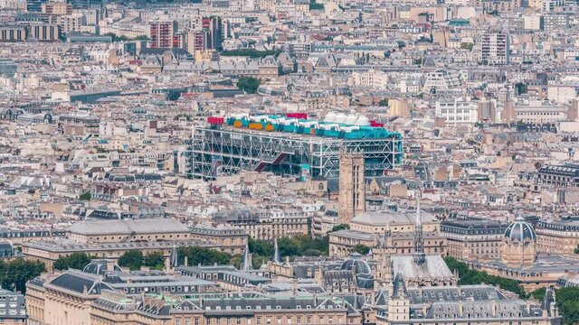 Top view of Paris skyline from above timelapse. Main landmarks of european megapolis with Centre of Pompidou. Bird-eye view from observation deck of Montparnasse tower. Paris, France
