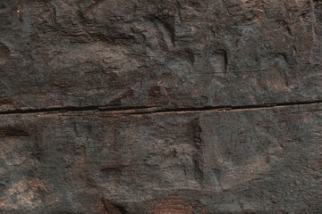 Old brown wooden texture with cracks and scratches as a background image. Copy, empty space for text