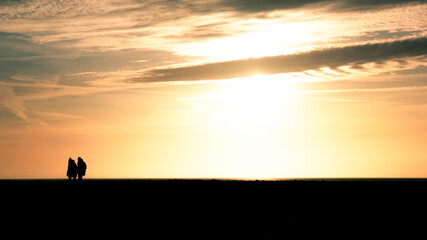 Fototapeta premium Silhouettes in the sunset